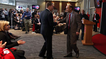 Dec 5, 2014; Lincoln, NE, USA; Nebraska Cornhuskers head coach Mike Riley (right) shakes hands with athletic director Shawn Eichorst at Memorial Stadium. Mandatory Credit: Bruce Thorson-Imagn Images