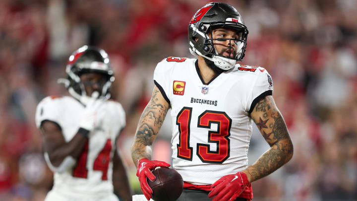 Oct 2, 2022; Tampa, Florida, USA;  Tampa Bay Buccaneers wide receiver Mike Evans (13) reacts after scoring a touchdown  against the Kansas City Chiefs in the second quarter at Raymond James Stadium. Mandatory Credit: Nathan Ray Seebeck-USA TODAY Sports