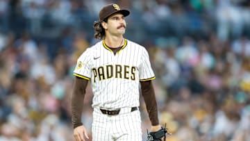 Sep 13, 2025; San Diego, California, USA; San Diego Padres starting pitcher Dylan Cease (84) reacts after walking a batter during the fourth inning against the Colorado Rockies at Petco Park. Mandatory Credit: David Frerker-Imagn Images