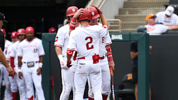 Indiana's Jasen Oliver (2) and Indiana's Tyler Cerny (8) celebrate after Oliver hits a home run during a NCAA Baseball Tournament Knoxville Regional game at Lindsey Nelson Stadium on Sunday, June 2, 2024 in Knoxville, Tenn.