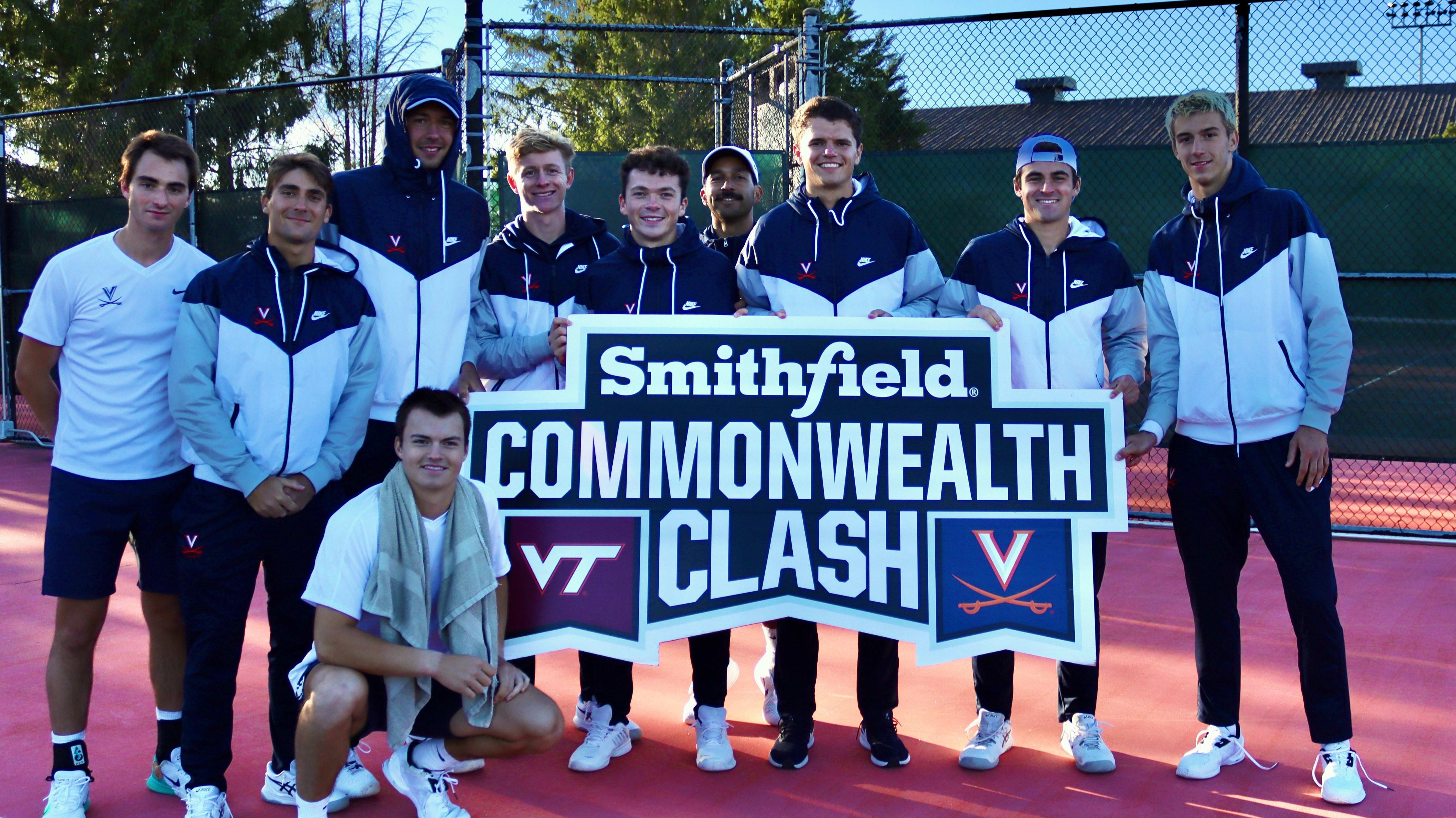 The Virginia men's tennis team celebrates after defeating Virginia Tech in the Commonwealth Clash.