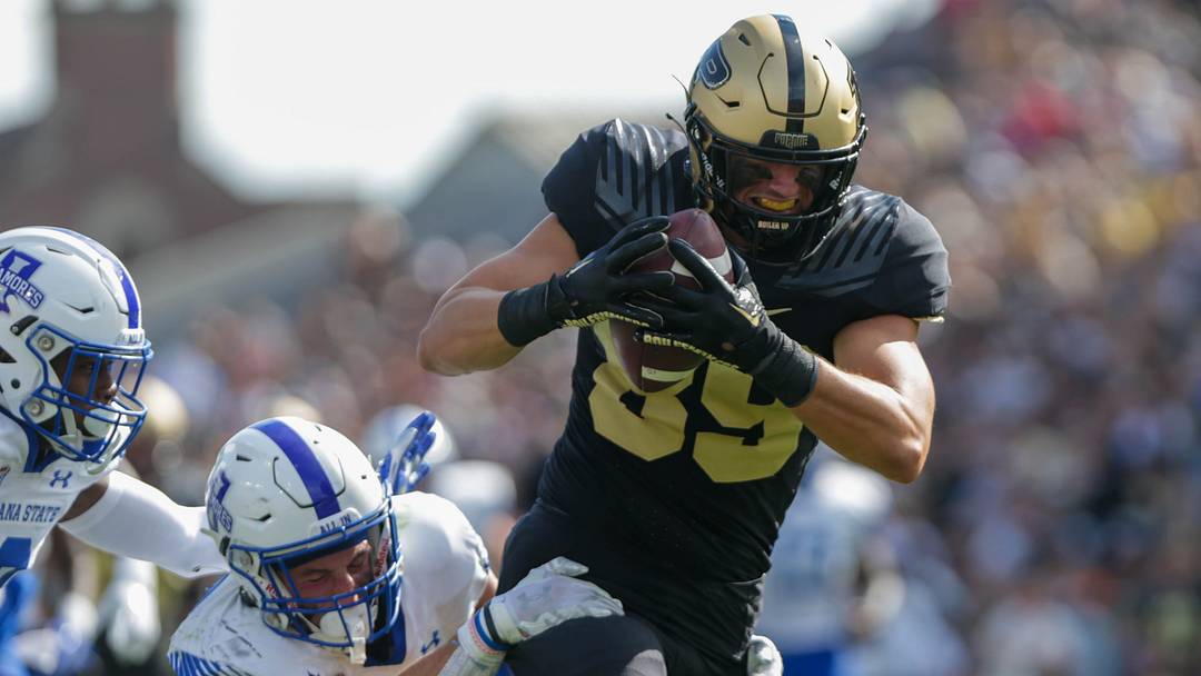Purdue Boilermakers tight end Paul Piferi (89) scores a touchdown, Purdue Boilermakers tight end Paul Piferi (89) scores a touchdown,