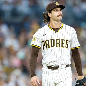 Sep 13, 2025; San Diego, California, USA; San Diego Padres starting pitcher Dylan Cease (84) reacts after walking a batter during the fourth inning against the Colorado Rockies at Petco Park. Mandatory Credit: David Frerker-Imagn Images