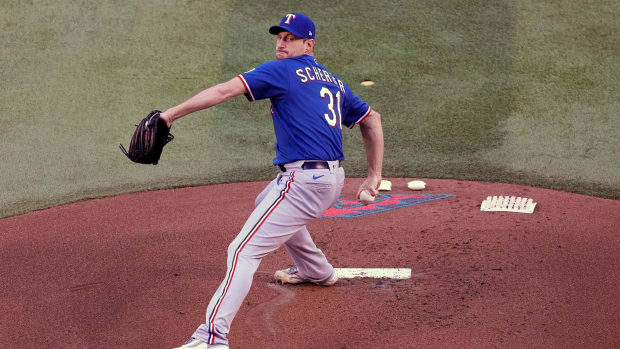 Oct 30, 2023; Phoenix, Arizona, USA; Texas Rangers starting pitcher Max Scherzer (31) pitches in the first inning against the Arizona Diamondbacks in game three of the 2023 World Series at Chase Field. Mandatory Credit: Joe Camporeale-USA TODAY Sports