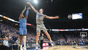 Dec 20, 2023; Omaha, Nebraska, USA;  Villanova Wildcats forward Eric Dixon (43) scores on a three