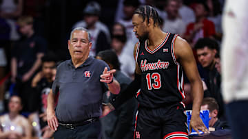 Feb 15, 2025; Tucson, Arizona, USA; Houston Cougars head Kelvin Sampson talks with forward J’Wan Roberts (13) during the first half against the Arizona Wildcats at McKale Center. Mandatory Credit: Aryanna Frank-Imagn Images