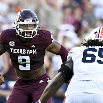Sep 27, 2025; College Station, Texas, USA; Texas A&M Aggies defensive end Cashius Howell (9) defends in coverage against the Auburn Tigers during the fourth quarter at Kyle Field. Mandatory Credit: Maria Lysaker-Imagn Images 