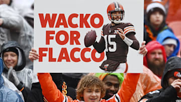 Dec 17, 2023; Cleveland, Ohio, USA; A Cleveland Browns fan holds a sign supporting Cleveland Browns quarterback Joe Flacco (15) during the first quarter at Cleveland Browns Stadium. Mandatory Credit: Ken Blaze-Imagn Images