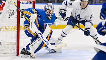Nov 2, 2024; St. Louis, Missouri, USA;  St. Louis Blues goaltender Jordan Binnington (50) defends the net against Toronto Maple Leafs left wing Matthew Knies (23) during the third period at Enterprise Center. Mandatory Credit: Jeff Curry-Imagn Images