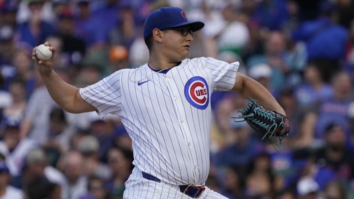 Jun 23, 2024; Chicago, Illinois, USA; Chicago Cubs pitcher Javier Assad (72) throws the ball against the New York Mets during the first inning at Wrigley Field. Mandatory Credit: David Banks-USA TODAY Sports