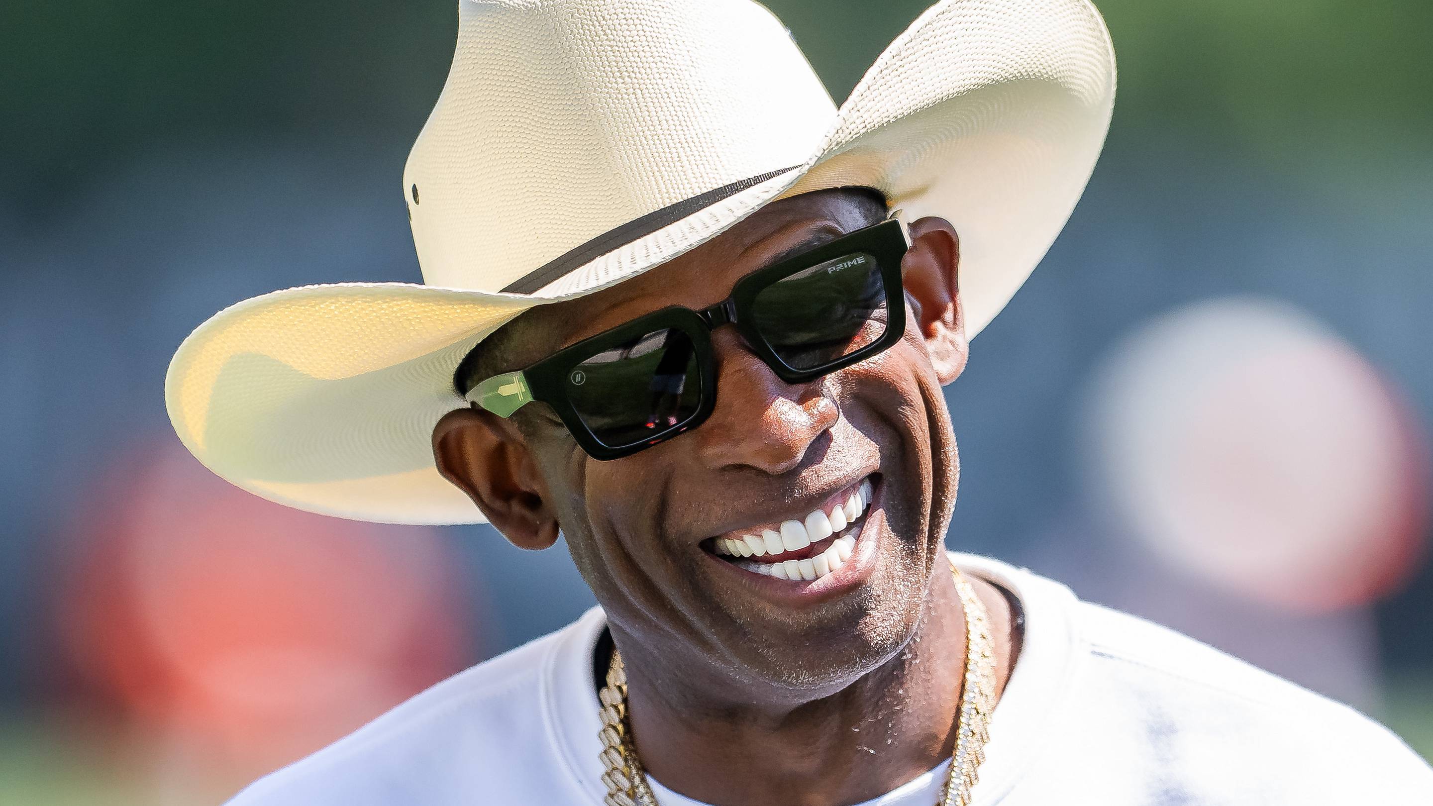 Jul 30, 2026; Berea, OH, USA; Cleveland Browns quarterback Shedeur Sanders (2) talks with his father Deion Sanders during training camp at CrossCountry Mortgage Campus. | IMAGN IMAGES via Reuters Connect