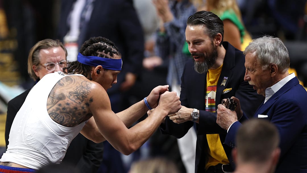 Jun 1, 2023; Denver, CO, USA; Denver Nuggets forward Aaron Gordon (left) fist bumps owner Stan Kroenke and vice chairman Josh Kroenke before the game against the Miami Heat in game one of the 2023 NBA Finals at Ball Arena. Mandatory Credit: Isaiah J. Downing-Imagn Images