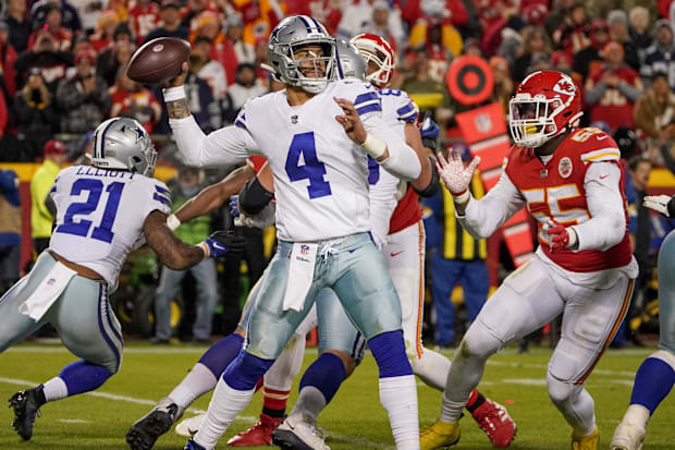 Dallas Cowboys quarterback Dak Prescott throws a pass as Kansas City Chiefs defensive end Frank Clark