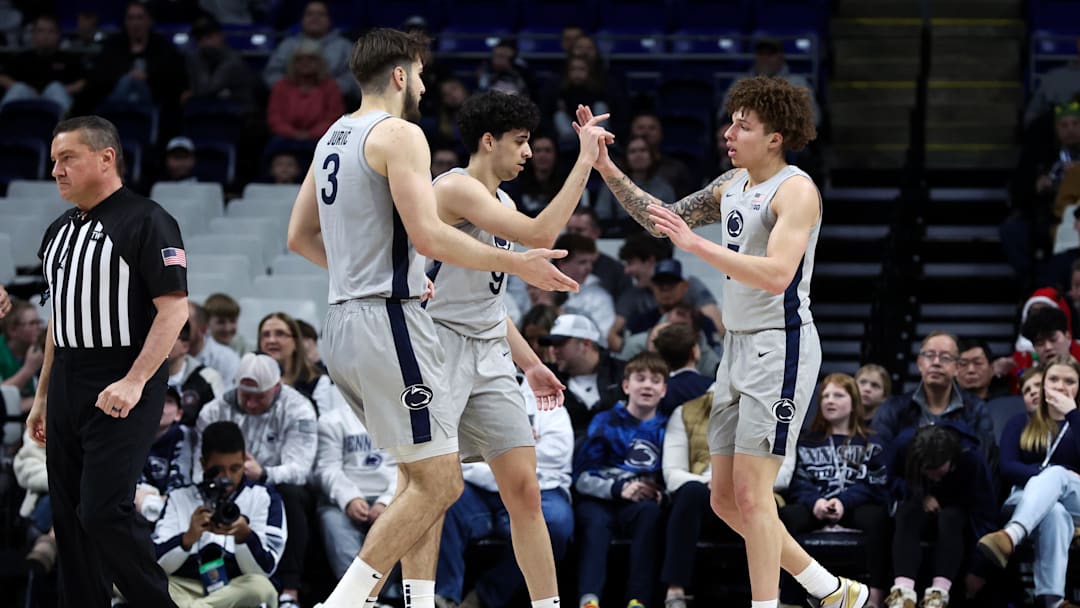 Dec 29, 2025; University Park, Pennsylvania, USA; Penn State Nittany Lions guard Dominick Stewart (7) is congratulated by teammates after being fouled during the second half against the North Carolina Central Eagles at Bryce Jordan Center. Mandatory Credit: Matthew O'Haren-Imagn Images