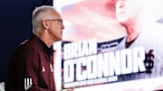 Newly hired Mississippi State coach Brian O'Connor records a welcome video at Dudy Noble Field.