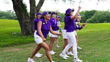 TCU Women's Golf celebrating after making a birdie