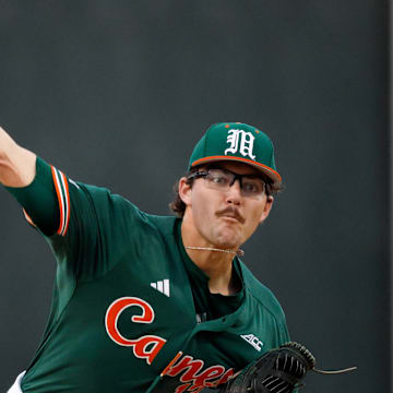 Griffin Hugus throwing for the Miami Hurricanes against Niagara.