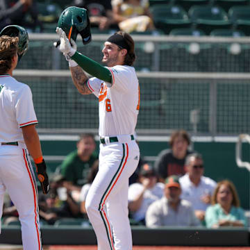 The Miami Hurricanes after a home run celebrating.