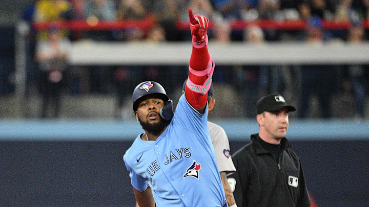 Sep 24, 2024; Toronto, Ontario, CAN; Toronto Blue Jays designated hitter Vladimir Guerrero Jr. (27) reacts after hitting a two run RBI double against the Boston Red Sox in the third inning at Rogers Centre. Sep 24, 2024; Toronto, Ontario, CAN; Toronto Blue Jays designated hitter Vladimir Guerrero Jr. (27) reacts after hitting a two run RBI double against the Boston Red Sox in the third inning at Rogers Centre.