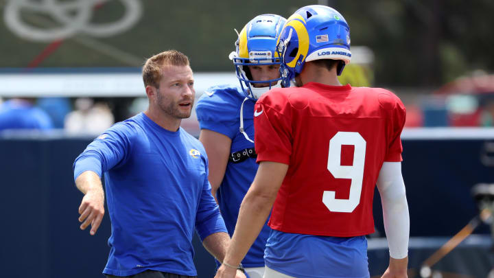 Jul 30, 2022; Irvine, CA, USA; Los Angeles Rams head coach Sean McVay (left) talks to wide receiver Cooper Kupp (10) and quarterback Matthew Stafford (9) during training camp at University of California Irvine. Mandatory Credit: Kiyoshi Mio-USA TODAY Sports