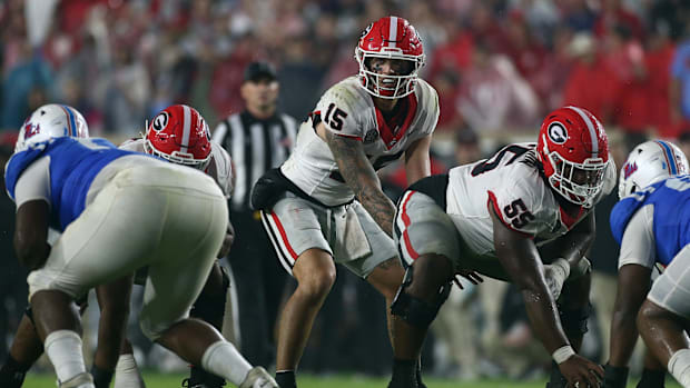 Nov 9, 2024; Oxford, Mississippi, USA; Georgia’s Carson Beck takes a snap under center vs. Ole Miss.