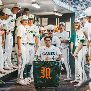 The Miami Hurricanes Baseball team celebrates a victory against Notre Dame 