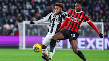 (R-L) Rafael Leao of AC Milan with Weston McKennie of...