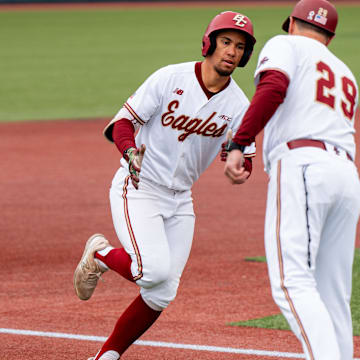 Former Boston College outfielder Cameron Leary rounds third base towards home after home run. 