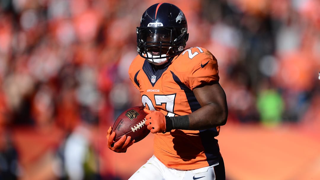 January 19, 2014; Denver, CO, USA; Denver Broncos running back Knowshon Moreno (27) runs the ball against the New England Patriots in the first half of the 2013 AFC Championship football game at Sports Authority Field at Mile High. 