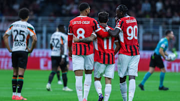 (R-L) Tammy Abraham of AC Milan with Christian Pulisic of AC...