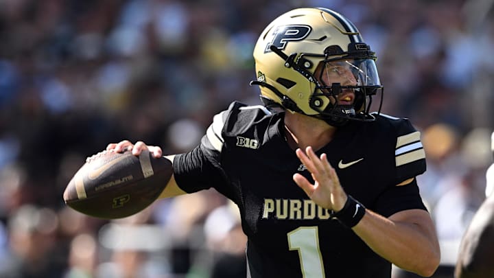 Purdue Boilermakers quarterback Hudson Card (1) throws a pass 