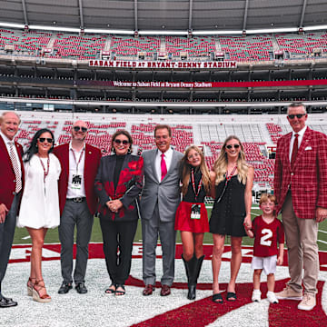 Nick Saban and family on Saban Field at Bryant-Denny Stadium- Sept. 7, 2024