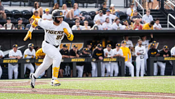 Catcher Mateo Serna runs toward first base. 
