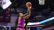 Ole Miss Rebels guard Madison Scott attempts a layup against the Kentucky Wildcats at the SJB Pavilion in Oxford, Miss.