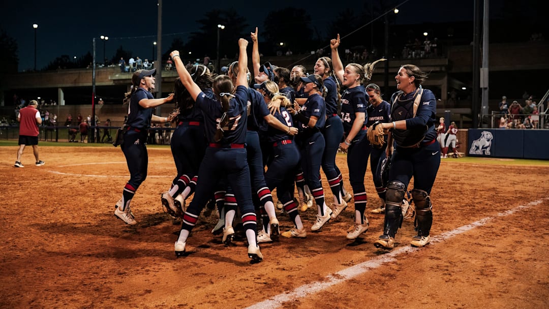 Samford softball team celebrates victory over Alabama