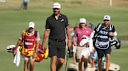 Sep 22, 2024; Carrolton, Texas, USA; Dustin Johnson of the 4Aces GC walks to the on the 18th green during the LIV Golf Dallas Team Championship Finals at Maridoe Golf Club. Mandatory Credit: Jim Cowsert-Imagn Images