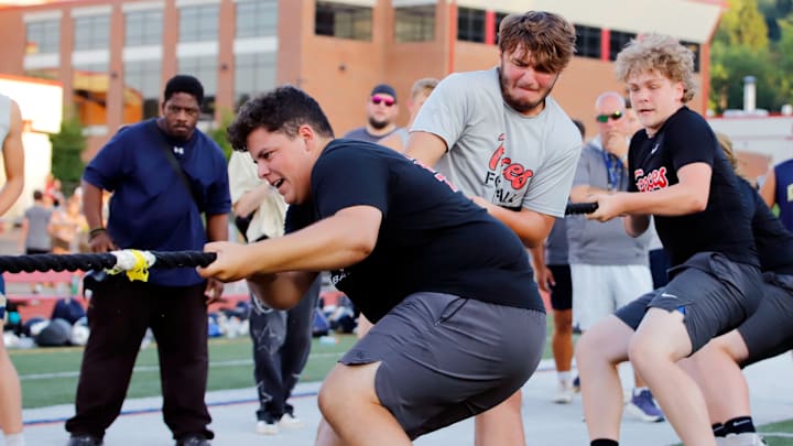 Members of Fox Chapel's football team compete in a Big Man Challenge in July. The Foxes' administration is one that is proposing a way to reshape WPIAL football. Members of Fox Chapel's football team compete in a Big Man Challenge in July. The Foxes' administration is one that is proposing a way to reshape WPIAL football.