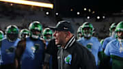 Coach Jon Sumrall fires up his team.