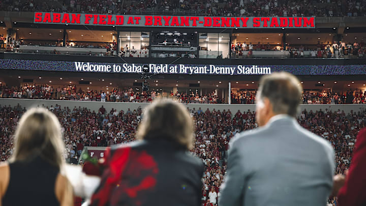 Nick Saban and his family look on at the new signage at Bryant-Denny Stadium