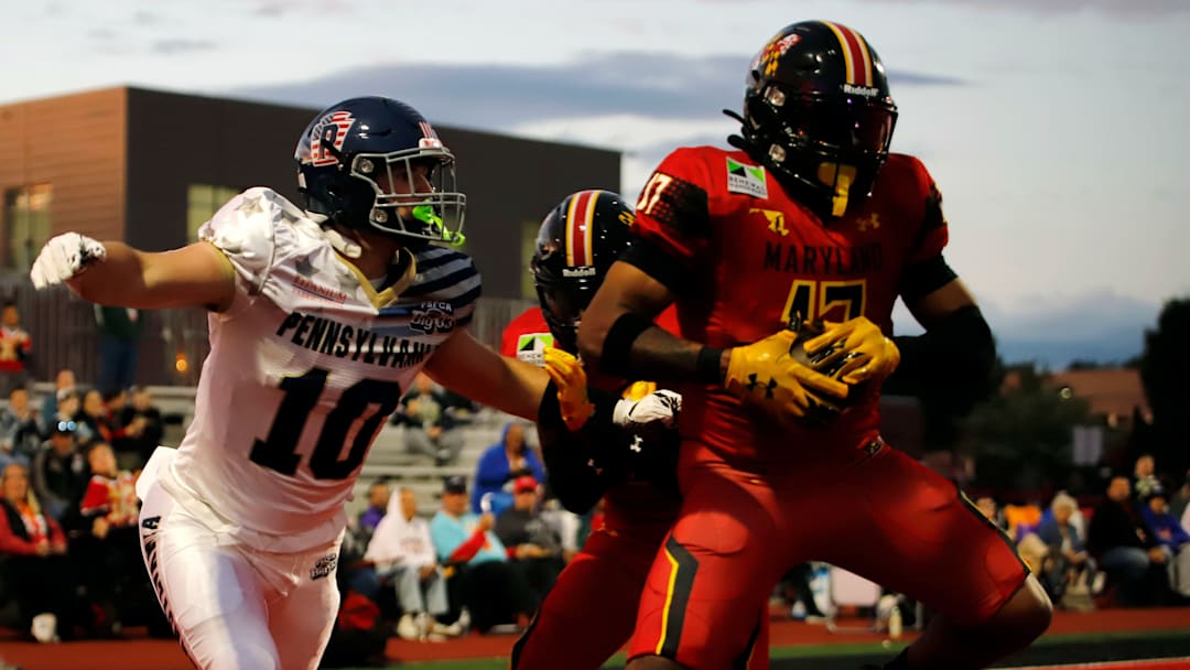 Last season, Team Maryland beat Team Pennsylvania at the Big 33. Marian Catholic's Michael Gelatko, left, attempts to tackle Maryland's Cameron Allen-Jones in the end zone after he intercepted a pass during last year's game.