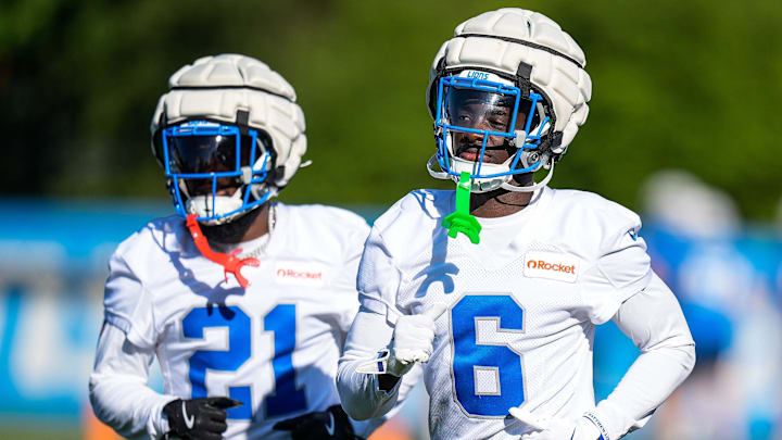 Detroit Lions cornerback Terrion Arnold (6), center, and cornerback Amik Robertson (21) practice during training camp at Meijer Performance Center in Allen Park on Tuesday, July 22, 2025.