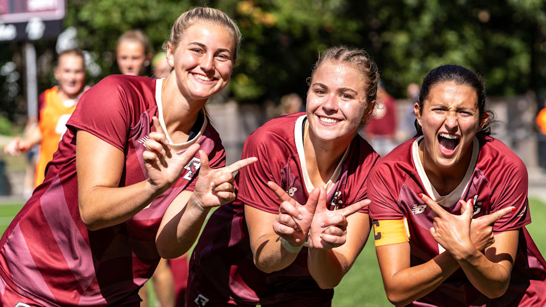 Boston College players pose to celebrate the program's seventh win of the season. BC was the quickest ACC team to reach that mark. 