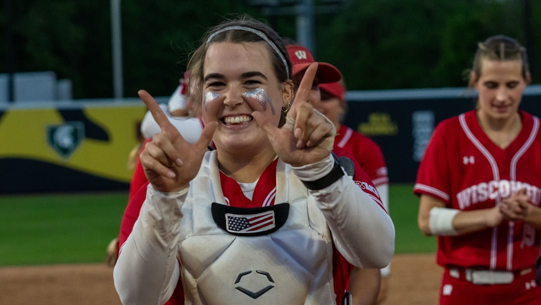Former Verona star Hilary Blomberg celebrates following the seventh-seeded University of Wisconsin softball team's 11-9 victory over second-seeded and No. 11-ranked Oregon in the quarterfinals of the Big Ten Conference Tournament on Thursday. 