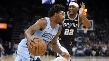 Jan 2, 2024; Memphis, Tennessee, USA; Memphis Grizzlies guard Marcus Smart (36) drives to the basket as San Antonio Spurs guard Malaki Branham (22) defends during the first half at FedExForum.