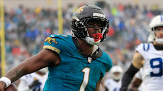 Jacksonville Jaguars running back Travis Etienne Jr. (1) scores a rushing touchdown during the second quarter of an NFL football game at EverBank Stadium, Sunday, Dec. 7, 2025, in Jacksonville, Fla. [Corey Perrine/Florida Times-Union]