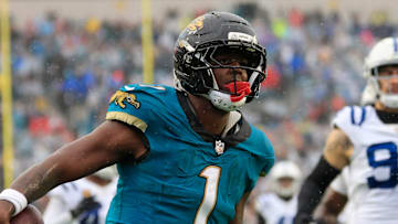 Jacksonville Jaguars running back Travis Etienne Jr. (1) scores a rushing touchdown during the second quarter of an NFL football game at EverBank Stadium, Sunday, Dec. 7, 2025, in Jacksonville, Fla. [Corey Perrine/Florida Times-Union]