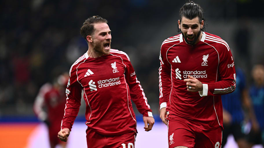 Dominik Szoboszlai and Alexis Mac Allister celebrate a Liverpool goal together.