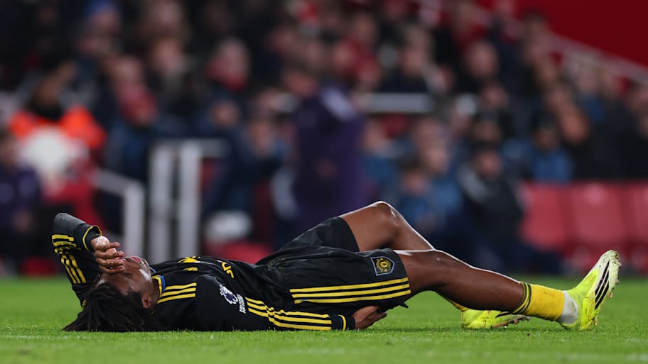 Patrick Dorgu lying injured.