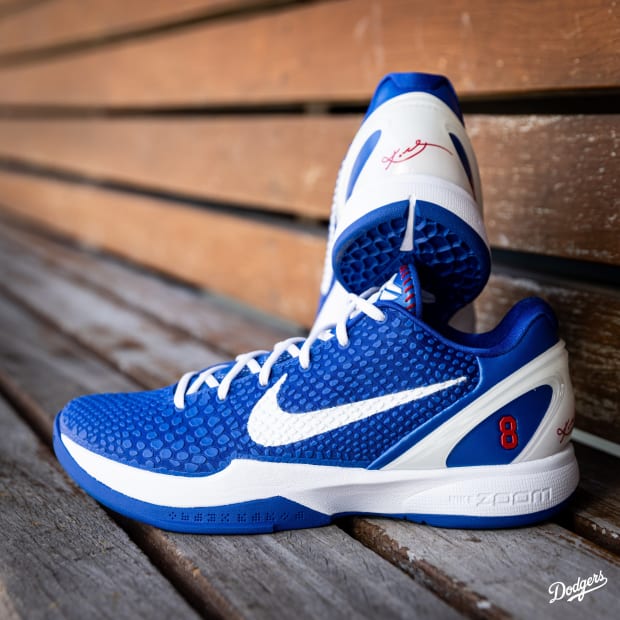 Kobe Bryant's blue and white Nike sneakers.