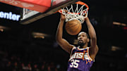Jan 9, 2025; Phoenix, Arizona, USA; Phoenix Suns forward Kevin Durant (35) slam dunks the ball against the Atlanta Hawks in the first half at Footprint Center. Mandatory Credit: Mark J. Rebilas-Imagn Images